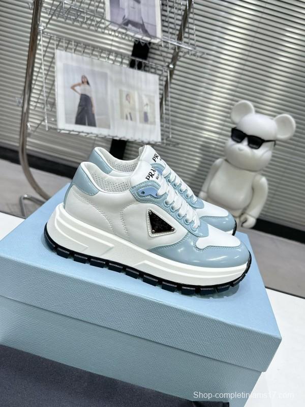 2025 Women Prada Light Blue White Leather Sneakers KFY00310